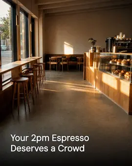 Generated post: warm empty cafe interior in afternoon light with a pastry case, headline about the 2pm espresso crowd baked into the image