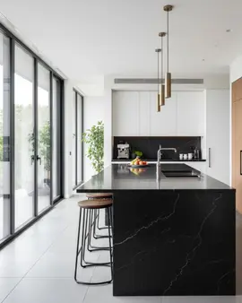 Generated post: black marbled quartz island with a waterfall edge in a modern kitchen