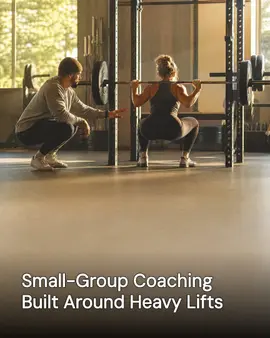 Generated post: coach cueing a lifter mid-squat in a power rack, golden hour light on the gym floor