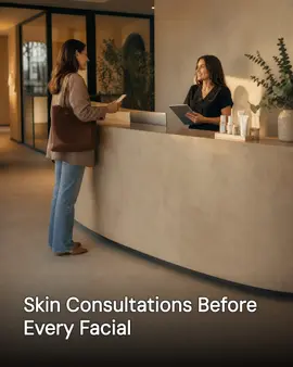Generated post: client talking with a provider at a med spa front desk, headline about skin consultations baked into the image